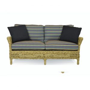 wicker loveseat with colorful cushions