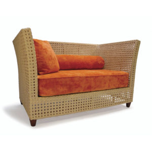 wicker settee with orange cushions